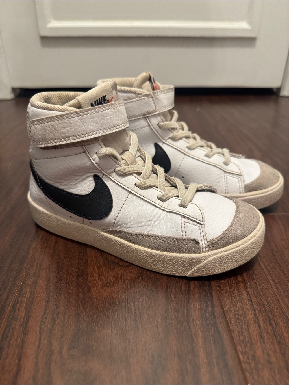 Nike Kids White High-Top Sneakers with Black Swoosh